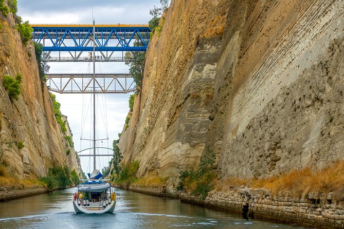 Ancient Olympia (birth place of Olympic Games) & Corinth Canal, Private Day Tour - Olympia town break: lunch and a river-crossing stroll