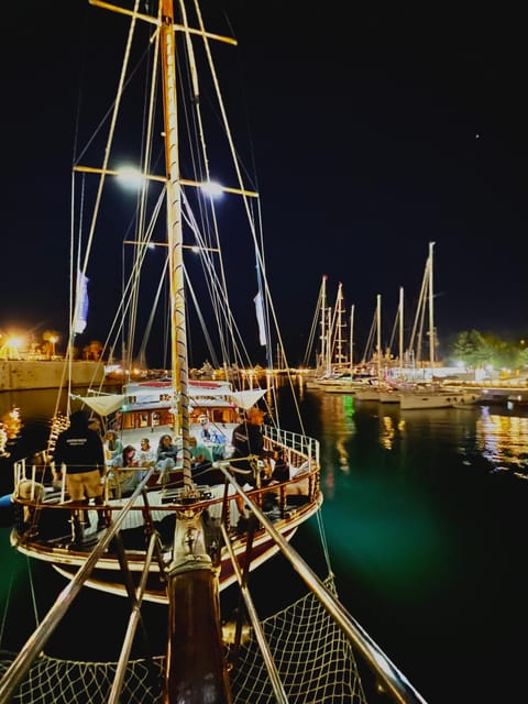 Athens: 3-Hour Sunset Cruise with Swim Stop, Snacks & Drinks - On CALYPSO: wooden sailboat comfort, music, and the drink flow