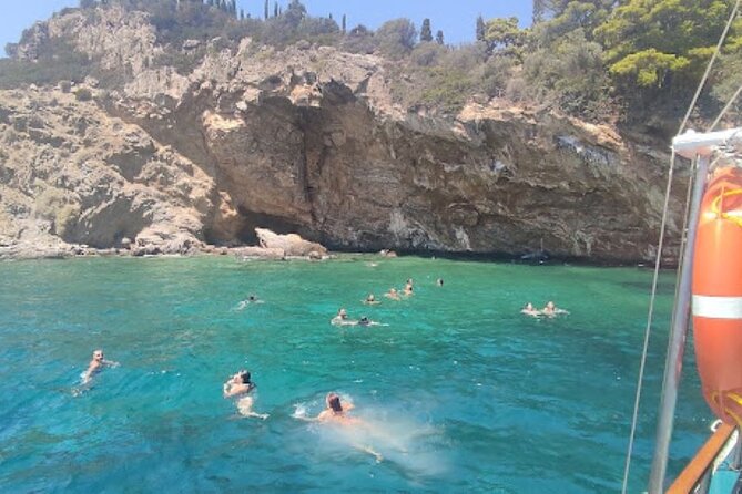 Athens Cruise Tour with Mediterranean BBQ - Stop 1, Erotospilia: the turquoise swim start with the sunken cave feel