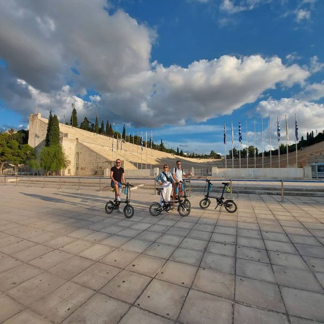 Athens: Discover the City Electric Bike Tour - Temple of Olympian Zeus and Acropolis edge rides: big views, short stops