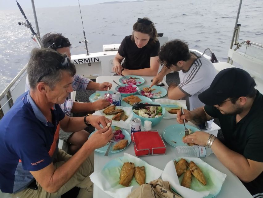 Athens: Fishing Trip Experience on a Boat with Seafood Meal - Swim Stops, Calm-Water Moments, and Mingle Time