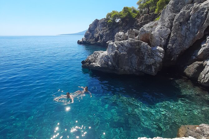 Athens: Full-Day Island Hopping Cruise with Lunch and Swimming - Agistri: cliffs, pine-covered hills, and a softer island feel