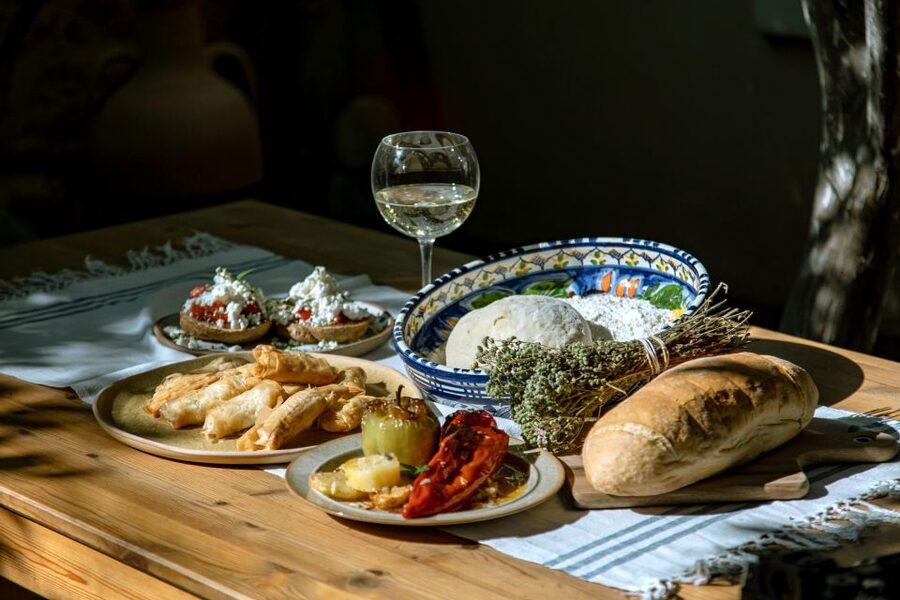 Athens: Kerameikos Stone House Cooking Class - The meal in the garden, wine included