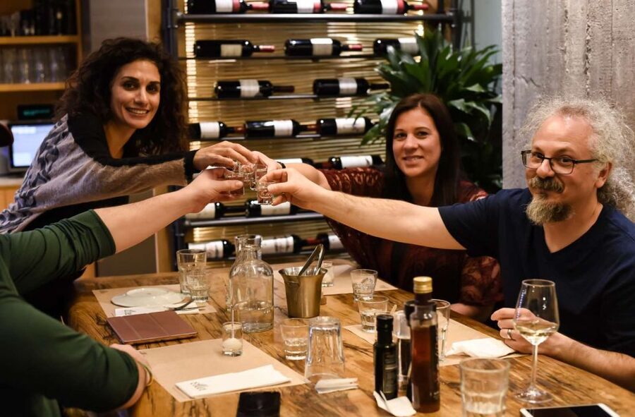 Athens: Private Evening City Walk & 4-Course Curated Dinner - Monastiraki after dark, the open-air flea market walk-through