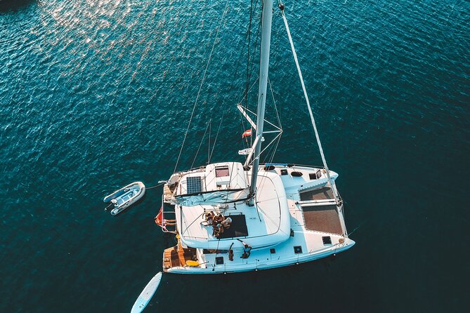 Athens Private Full day Catamaran cruise with meal & drinks - Stop 1, Sailing Setup at Istion Yachting (10 minutes, then you’re gone)