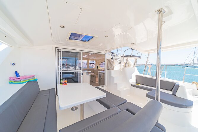 Athens Private Full day Catamaran cruise with meal & drinks - Lunch on Board: Seafood Pasta, Salads, Appetizers, and Bottled Water