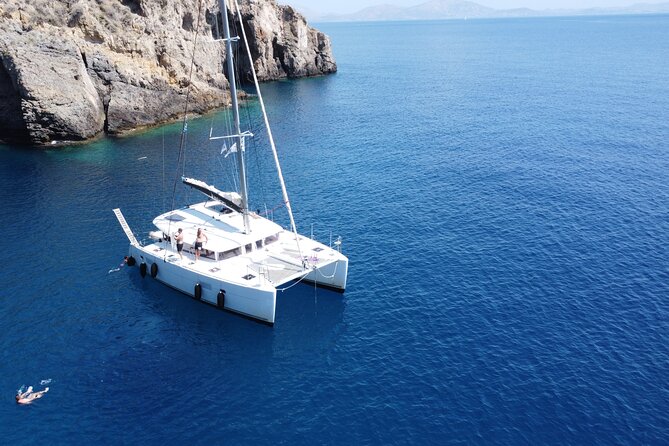Athens Private Half day Catamaran cruise with meal & drinks - Vouliagmeni swim stop: sheltered water and an easy first swim