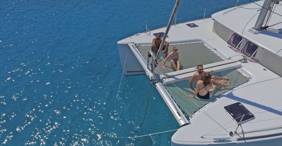 Athens: Riviera Catamaran Cruise with Meal and Drinks - On the Athens Riviera: coastline views with a crew that talks