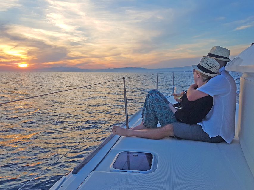 Athens: Riviera Catamaran Cruise with Meal and Drinks - Voula swim stop: stretch your legs, cool off fast