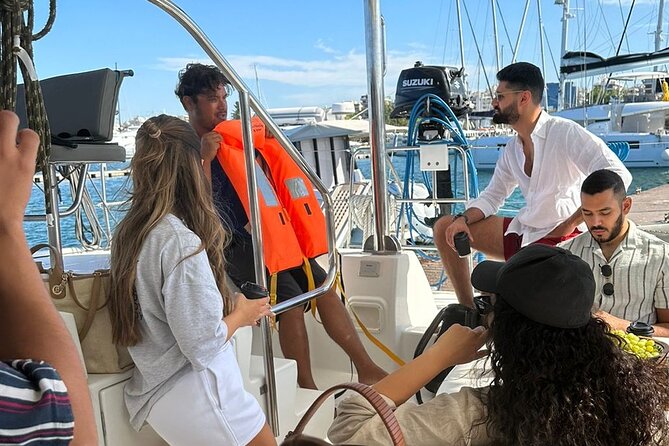 Athens Riviera Private Sail Catamaran with Meal and Wine - Vouliagmeni Bay swim stop: your first hit of Aegean time