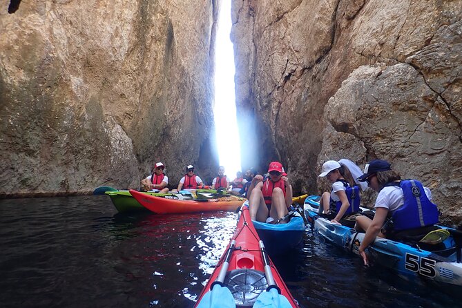 Athens Riviera: Sea Kayak and Snorkeling Adventure with Picnic - Coastline routes, rock formations, and that fun teamwork feel