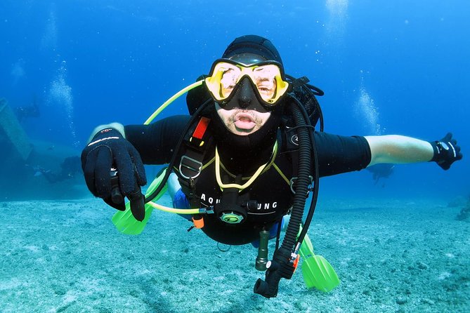 Athens Scuba Diving Experience for Certified Divers with Pickup - Shore entry reality: rocky terrain and gear management