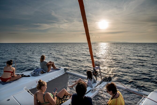 Athens Semi Private Sunset Catamaran Cruise with meal & drinks - Lunch onboard with seafood pasta, salads, appetizers, and drinks that stay classy