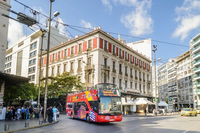 Athens Shore Excursion: Athens and Piraeus Hop-On Hop-Off Bus Tour - On-board experience: open-top views, 13-language audio, and the free drink
