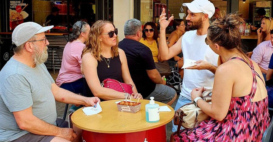 Athens: Street Food Tasting Tour - The shopping district walk, plus the boat-shaped pizza stop