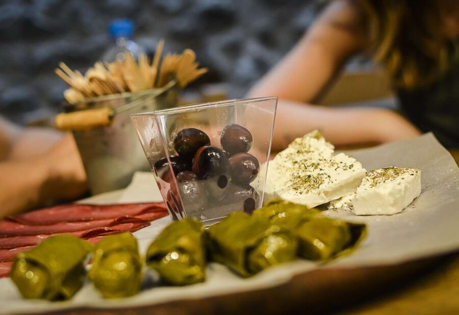 Athens: Ultimate Food Walking Tour with 15 Tastings - Stop by stop: Greek pastries, olives, and the salty starters