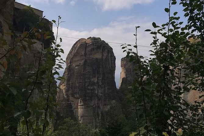 Delphi and Meteora Private Day Trip from Athens including Dinner - Distomo memorial and the dinner finale in Bournazi Square
