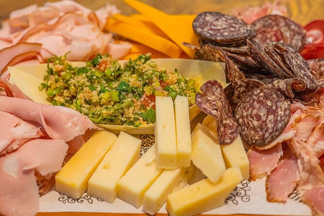Feast on Athens: LGBTQ+ Walking Food Tour - Evripidou Spice Markets: Tea Tasting and Charcuterie Stops