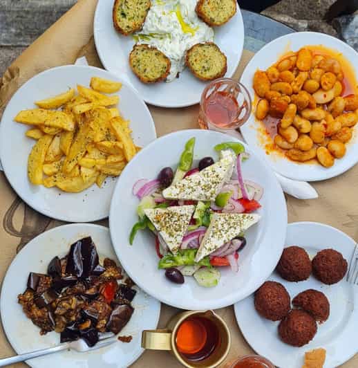 Food Tour evenings and Sundays - Psirri focus: loukoumades, bougatsa, coffee, and a night-walk payoff