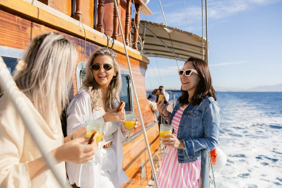 Half-Day Athens Cruise: Swim Stop,Lunch, and Drinks Included - Traditional wooden boat and the Athenian Riviera: what the 9am sail feels like