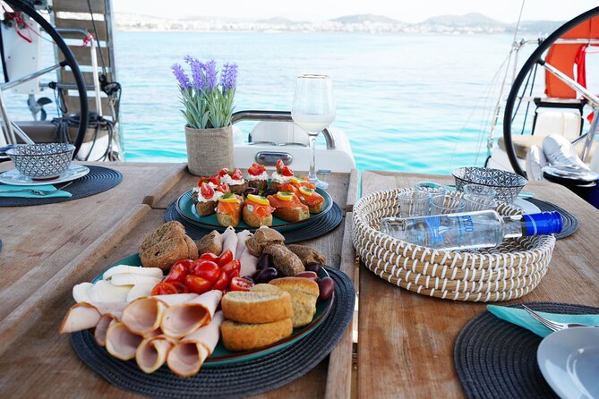 Luxury Catamaran Full Day Private & Greek Gastronomy in Athens - Greek food and drinks on board: snacks all day, plus a few extras if you want them