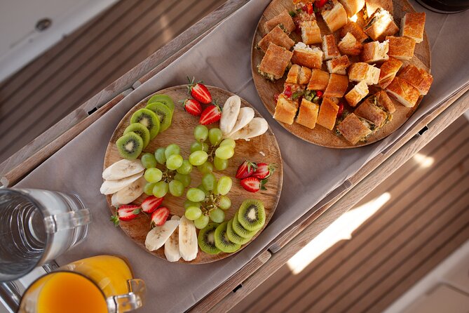 Luxury Catamaran Morning Private & Greek Gastronomy in Athens - Vouliagmeni Beach: Golden Sand, Another Swim Stop, and More Greek Flavor