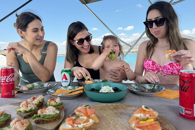 Luxury Catamaran Morning Semi-Private & Greek Gastronomy Athens - Breakfast bites, Greek lunch, and fresh desserts on board