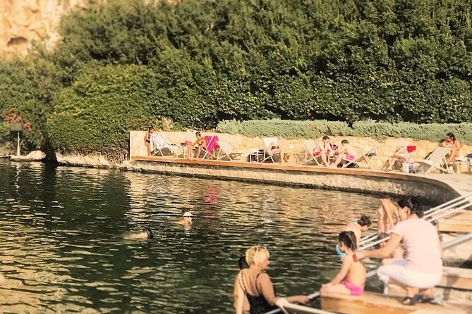 Relax Day: Thermal Lake, Olive Oil Tasting & Poseidon Temple Tour - Lake Vouliagmeni: swim time, towels, and the fishy surprise