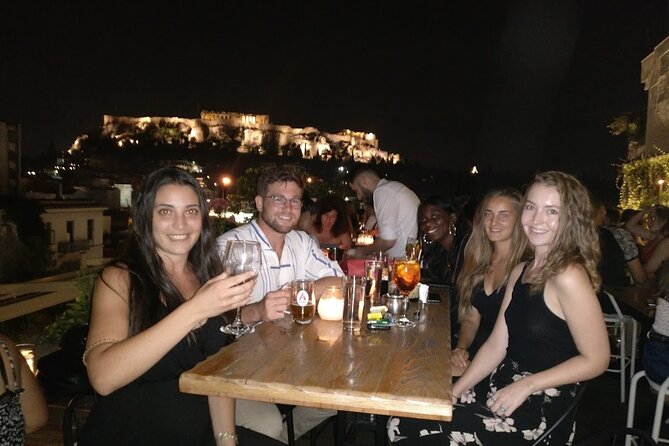 Rooftop Bar Hopping with Local Friends - Stop 3 rooftop bar: final Greek shot, last round of photos