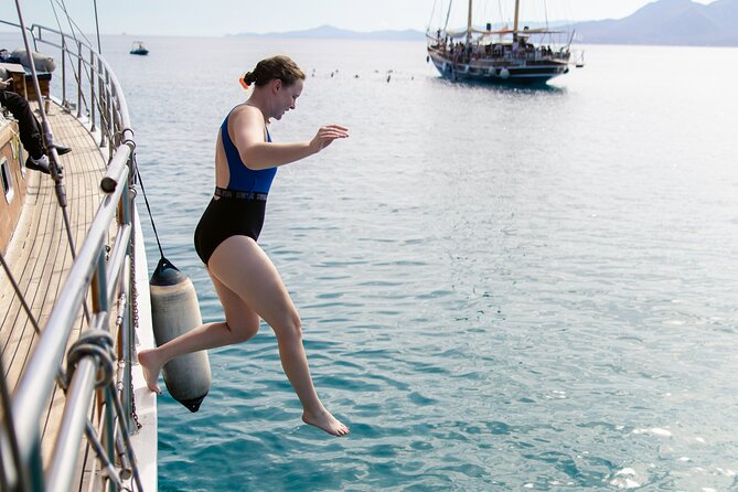 Sunset Dinner Cruise: Sunset, Swim, Drinks, and Dinner Onboard - Stop-by-stop route: Athens Riviera, Ydrousa, and Vouliagmeni swim time