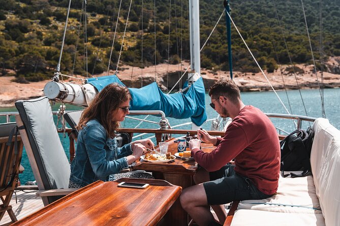 Sunset Dinner Cruise: Sunset, Swim, Drinks, and Dinner Onboard - Dinner onboard: what fresh-cooked on the water means for your evening