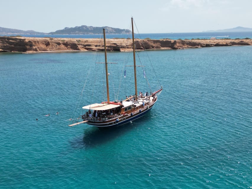 Sunset Dinner Cruise: Swim Stop, Drinks & Onboard Dining - Ydrousa Island Swim Stop: The Part You’ll Talk About Later
