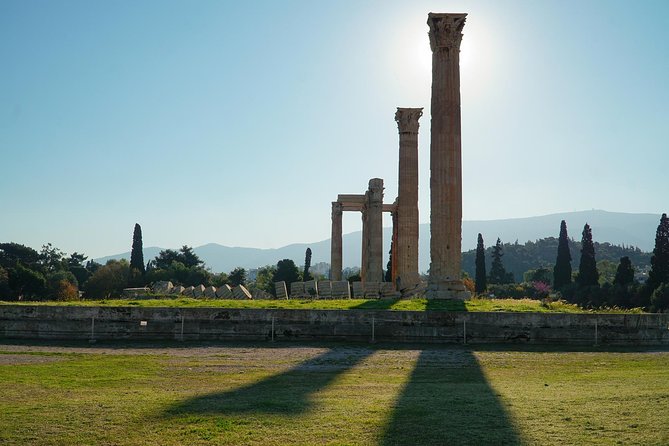 Temple of Olympian Zeus: Self-Guided Audio Tour on your Phone (without ticket) - Temple of Apollo Delphinios ruins: dolphins, Theseus, and the dark stories